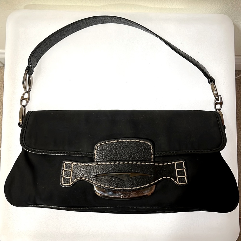 Tod’s black shoulder bag.